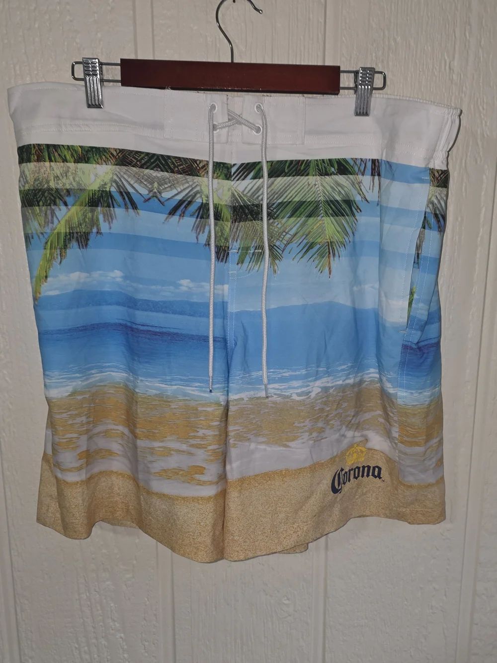 Corona Men’s Beach Scene Swim Trunks in Blue, White, Sand, Size XL